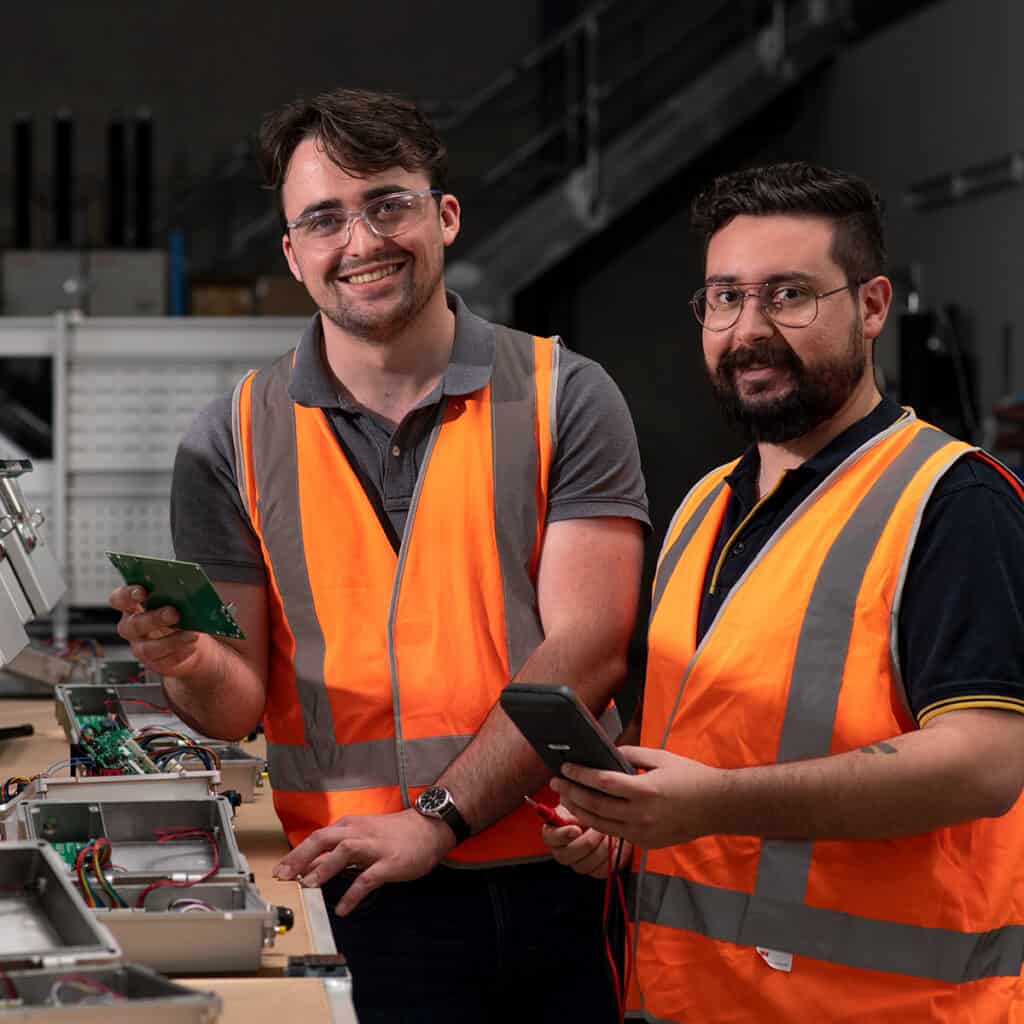 Novecom engineer and technician work on electronic sensors