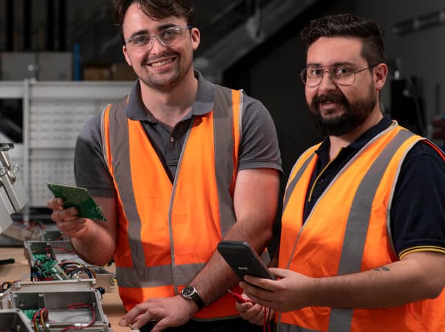 Novecom engineer and technician work on electronic sensors