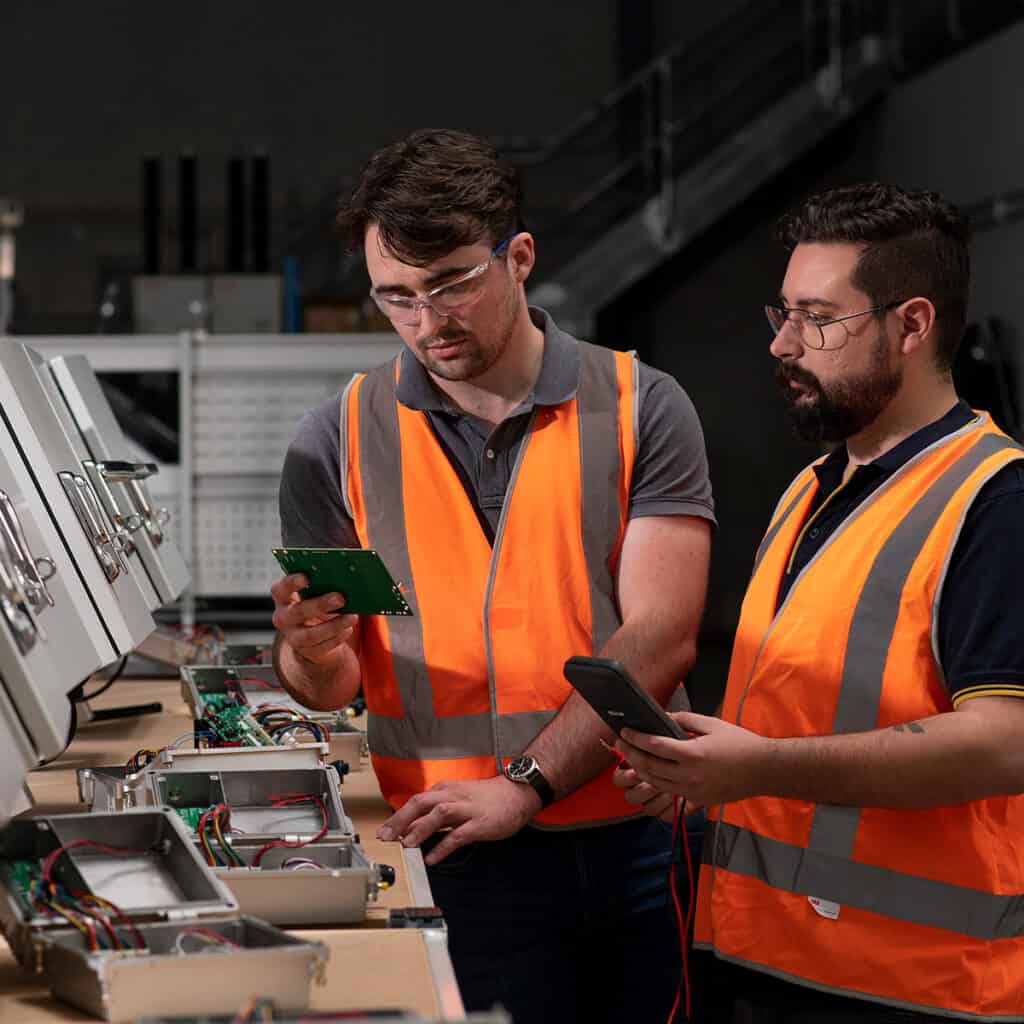 Sam and Bennett, two engineers at Novecom