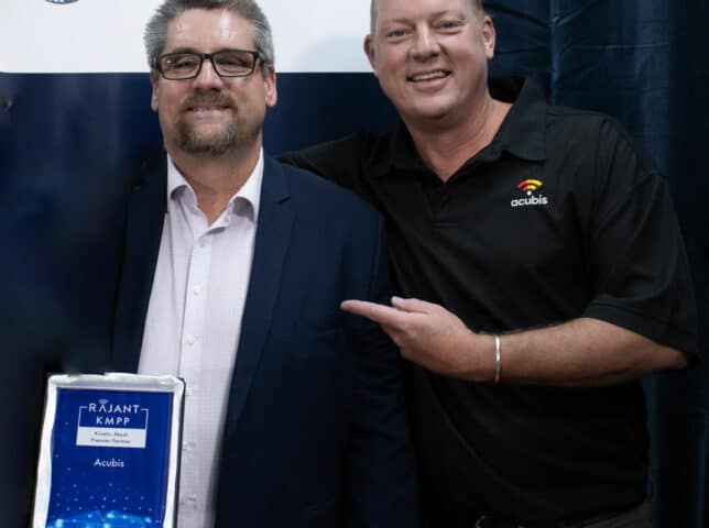 Jeff Berg with Madison rep accept Rajant accolade