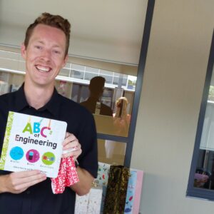 Chris Miles at the 2023 Christmas gift exchange 