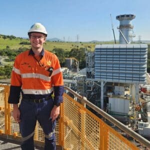 Kane wearing a high-vis work uniform.